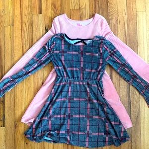 2 barely worn girls dresses. Size M